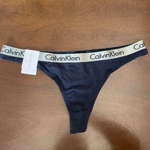 Cute Calvin Klein navy blue thong in large women’s new with tags